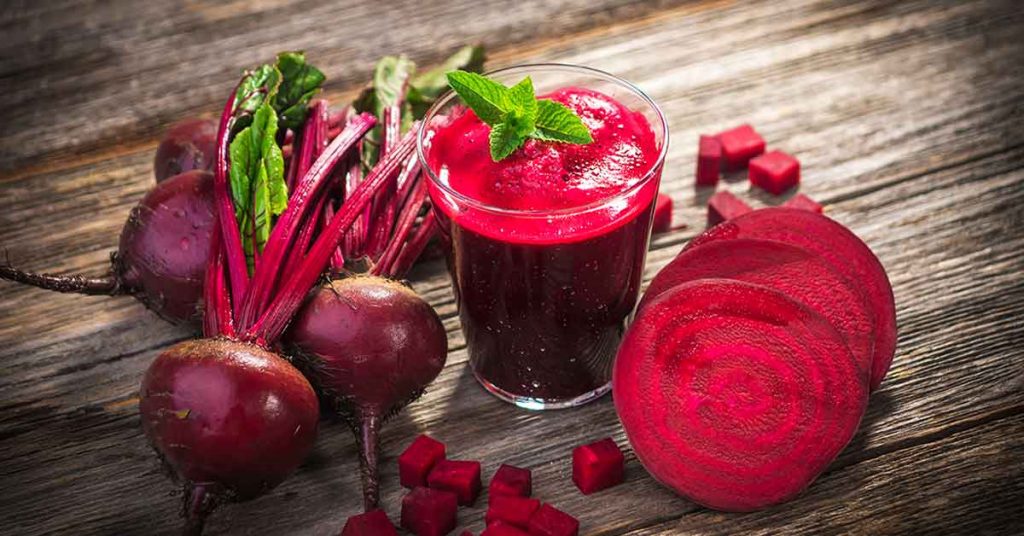 Beets and a glass of beet juice.