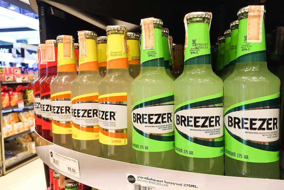 Various Alcopops On a Store Shelf.