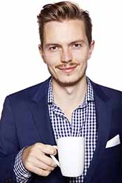 A Businessman Drinking a Cup of Bulletproof Coffee.