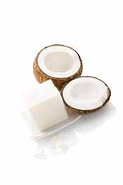 Picture of a Coconut Split In Half, With Coconut Flesh and Oil.