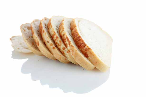 Picture of Six Slices of Bread on a White Background.