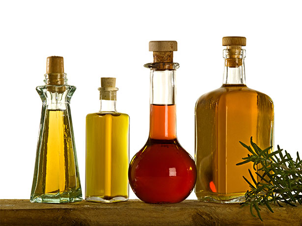 Various Cooking Oils In Glass Bottles.