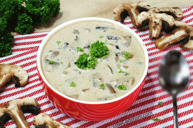 A Keto-Friendly Cream of Mushroom Soup In a Red Bowl.