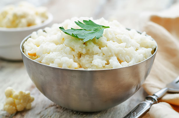 Egg-fried Cauliflower Rice In a Metal Bowl.