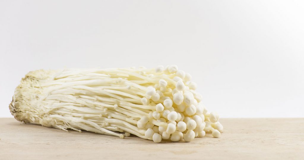 A bunch of enoki mushrooms.