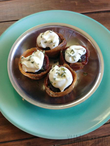 Picture of homemade meatloaf muffins wrapped in bacon.