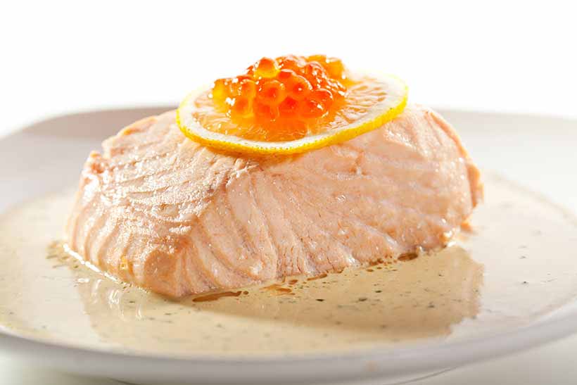 Poached Salmon In a Cream Sauce and Topped With Fish Roe.