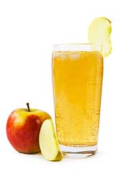 Glass of Apple Juice Next To An Apple.