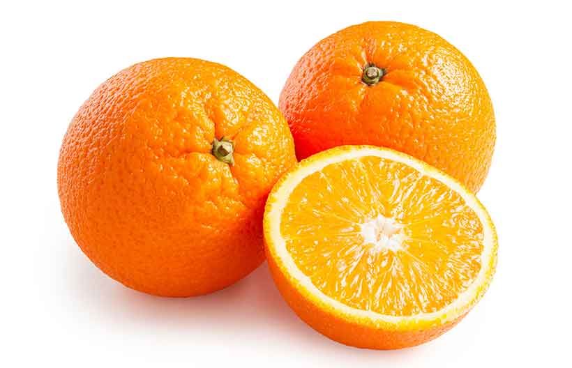 Two whole oranges and half an orange showing its inner flesh.