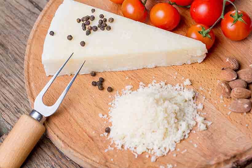 Pecorino-Romano Cheese on a Wooden Chopping Board.