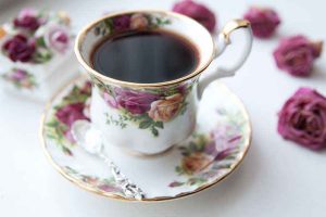 A Cup of Black Tea in a China Cup With Saucer. A Cup of Black Tea.
