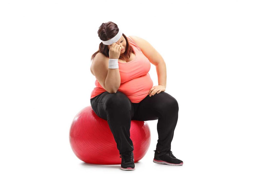 A Girl Feeling Frustrated About How Long It Takes To Lose Weight.