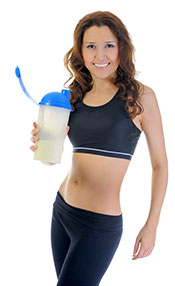 Picture of a Young Woman Drinking a High Protein Whey Shake..