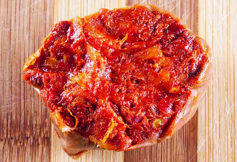 Spreadable Nduja Meat On a Wooden Board.