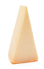 A Triangle Shaped Piece of Cheddar Cheese.