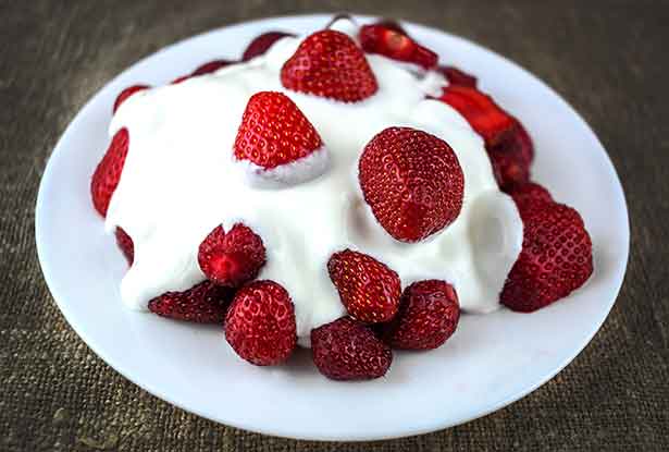 Plate of Fresh Strawberries and Vanilla Heavy Cream.