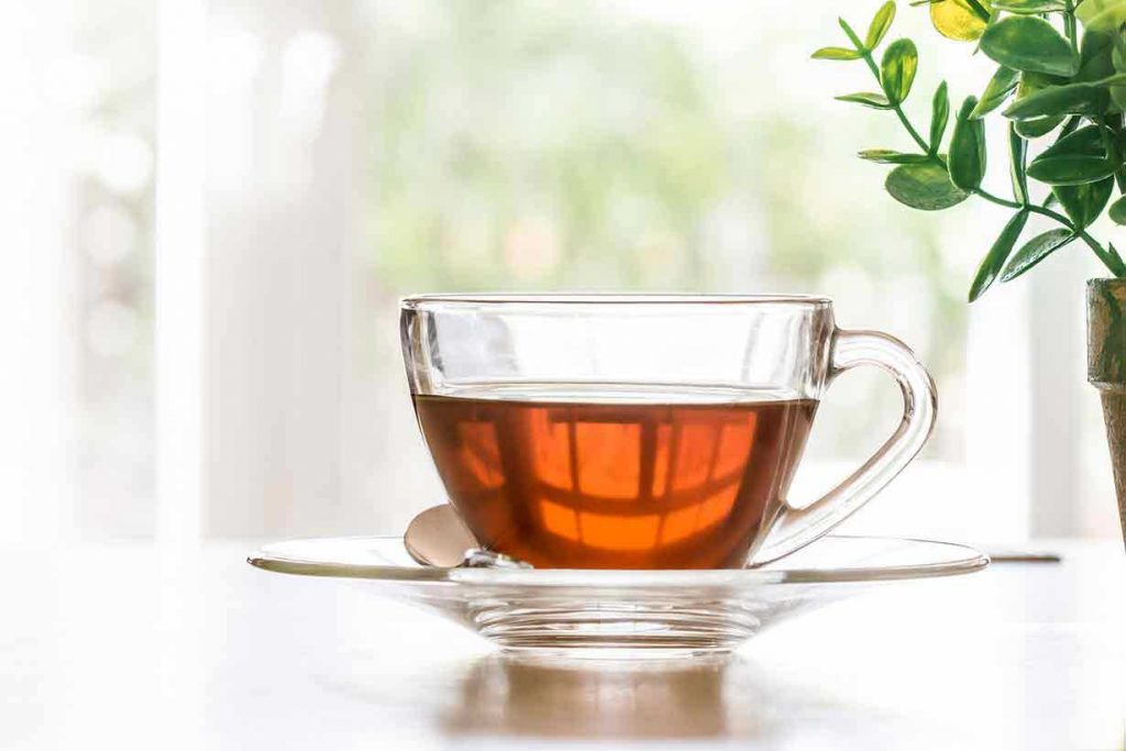 A Glass Cup of Black tea.