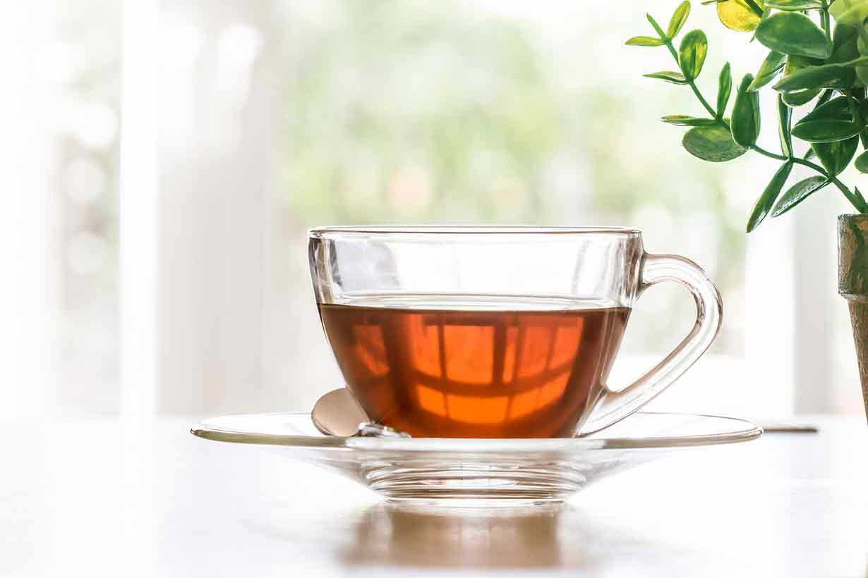 A Glass Cup of Black tea.