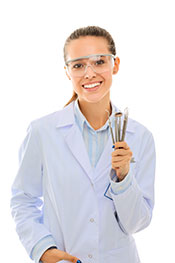 A Young Female Dentist With Dental Apparatus.