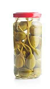 A Glass Jar of Pickled Caper Berries.