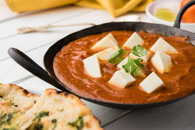 A Curry Featuring Cubes of Paneer Cheese.