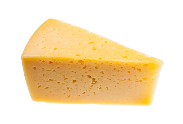 A triangular block of Tilsit cheese.