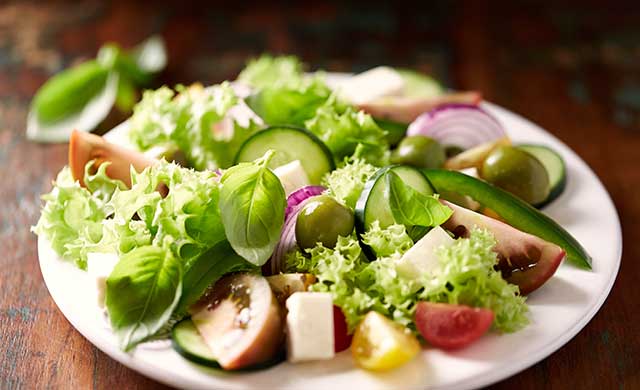 A Greek Salad Featuring Feta Cheese and Castelvetrano Olives.