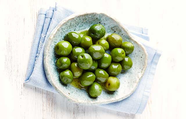 A Ceramic Plate of Castelvetrano Olives.