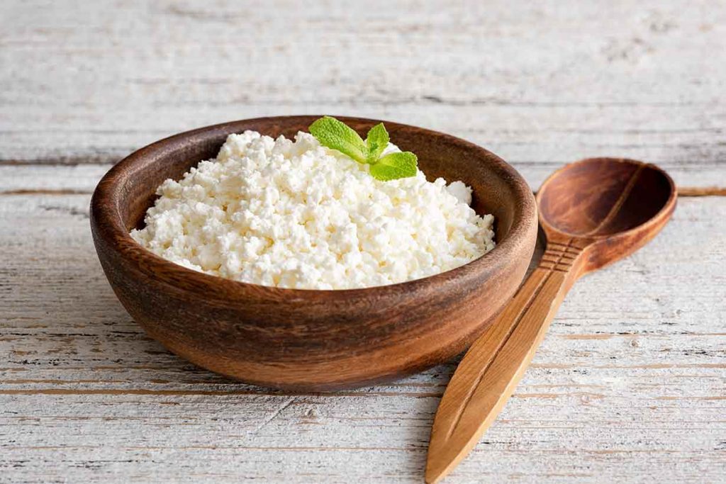 A Wooden Bowl of Cottage Cheese.