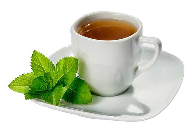 A Cup of White Tea On a Saucer.