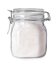 A Glass Jar of Granulated Allulose Sweetener.