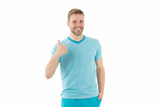 Happy Man In a Good Mood: Smiling and Doing Thumbs Up.