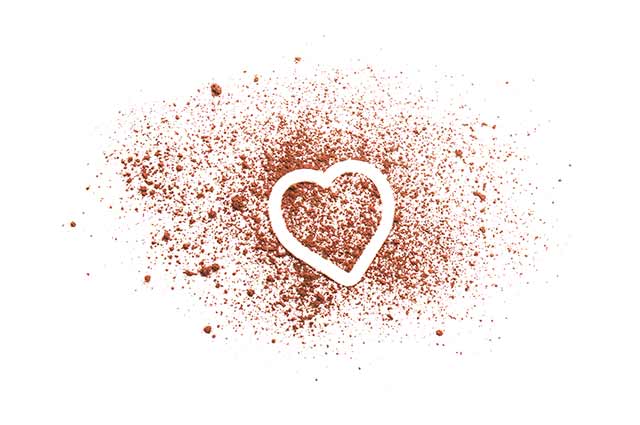 Cocoa Powder Made Into the Shape of a Heart.