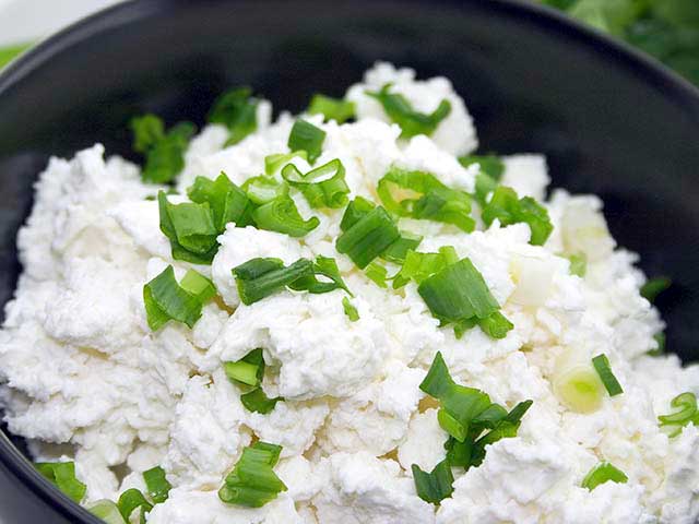 Mixing the Cottage Cheese and Chives Recipe.