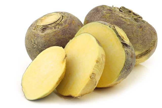 A Whole Rutabaga (Swede) With Some Large Slices.