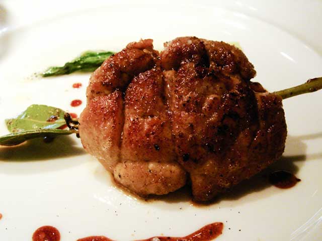 A Sauteed Sweetbread (Type of Organ Meat) On a Plate.