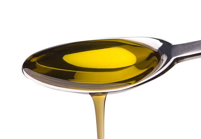 A Tablespoon of Cooking Oil Pouring.