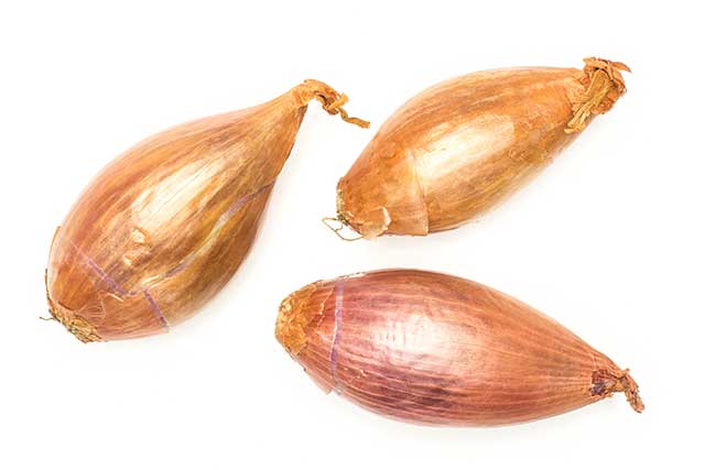 Three Unpeeled Whole Shallots.