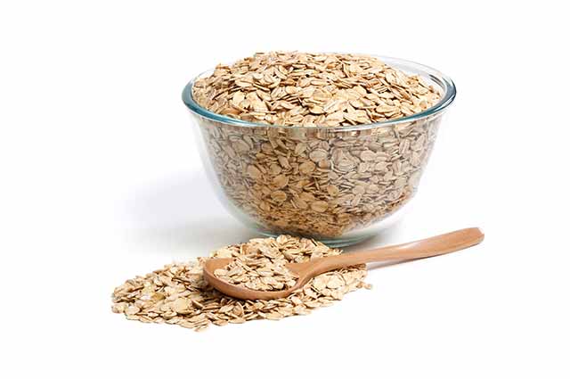 Raw Oats In a Glass Bowl.