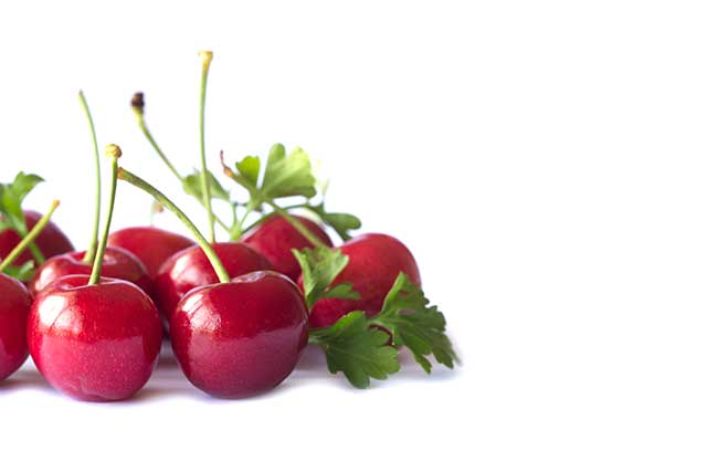 Red Cherries With Green Stems.