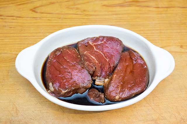 Steak Marinating In Soy Sauce, Olive Oil, and Red Wine.