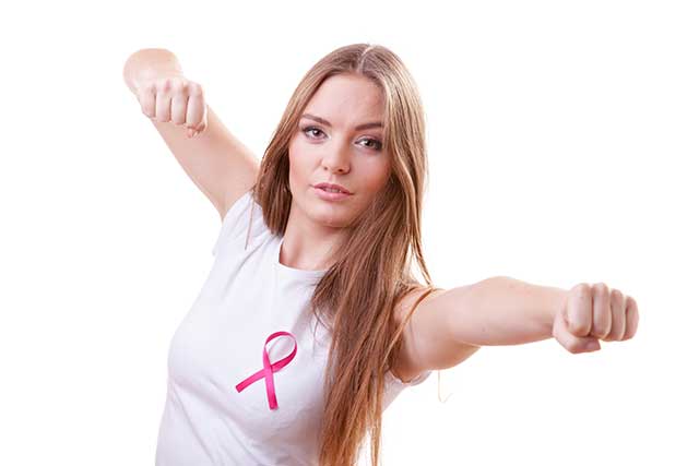 Woman Wearing Pink Ribbon Representing Fighting Against Cancer.