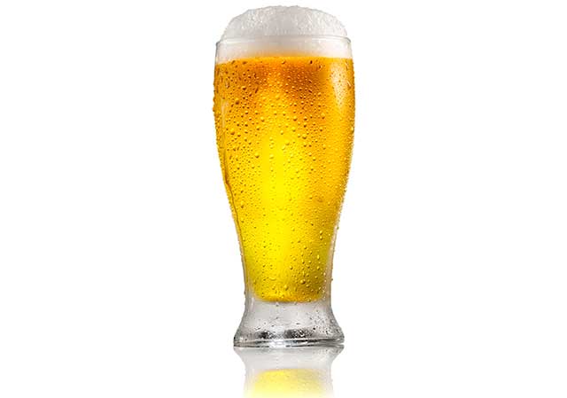 A Light Lager Beer In a Pint Glass.