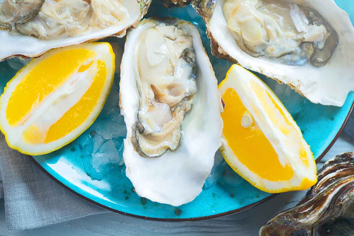 open-oysters-and-lemon-slices