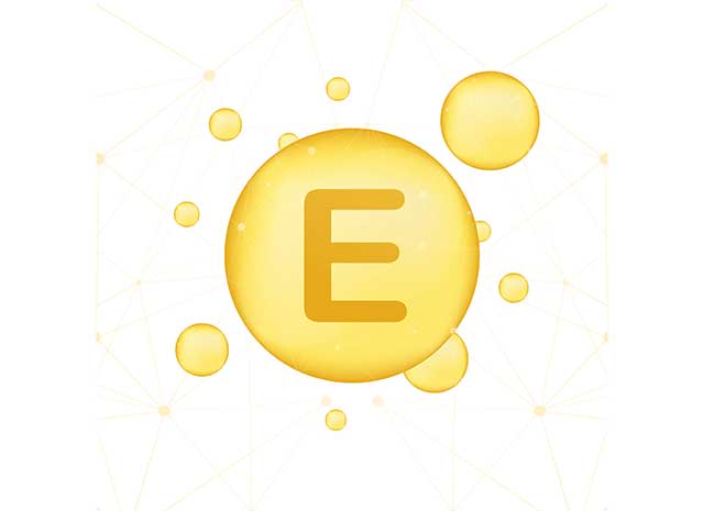 Vitamin E Letter In Gold Bubble.