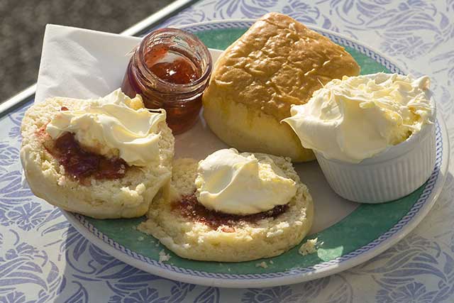 Clotted Cream, Scones, and Strawberry Jam - Traditional British Snack.