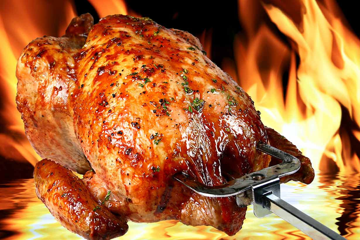 Roasted Chicken Meat With Flames In the Background.