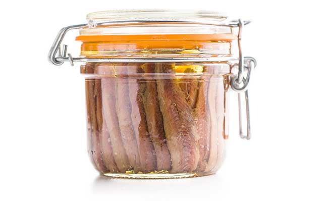 Anchovy Fillets Stored In Oil In a Glass Jar.