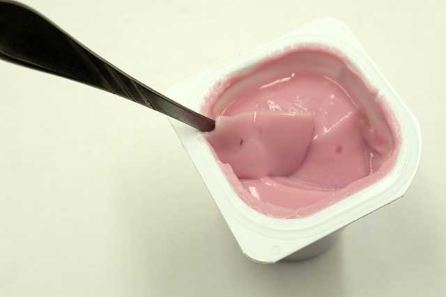 Sugar-Sweetened Strawberry Flavor Greek Yogurt Container.