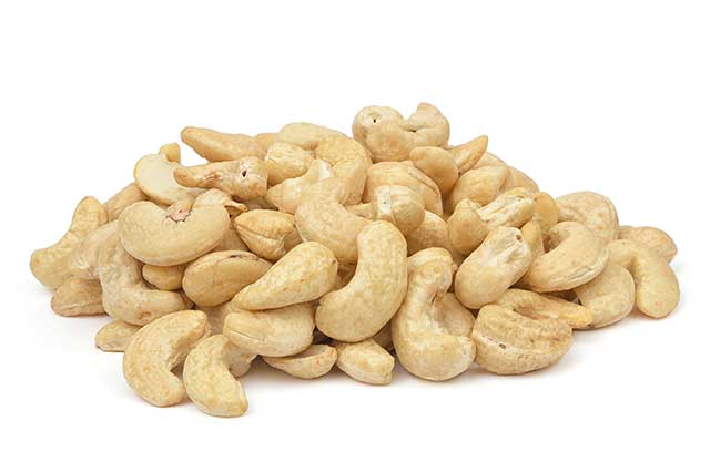 Pile of Cashew Nuts Without Their Shells.